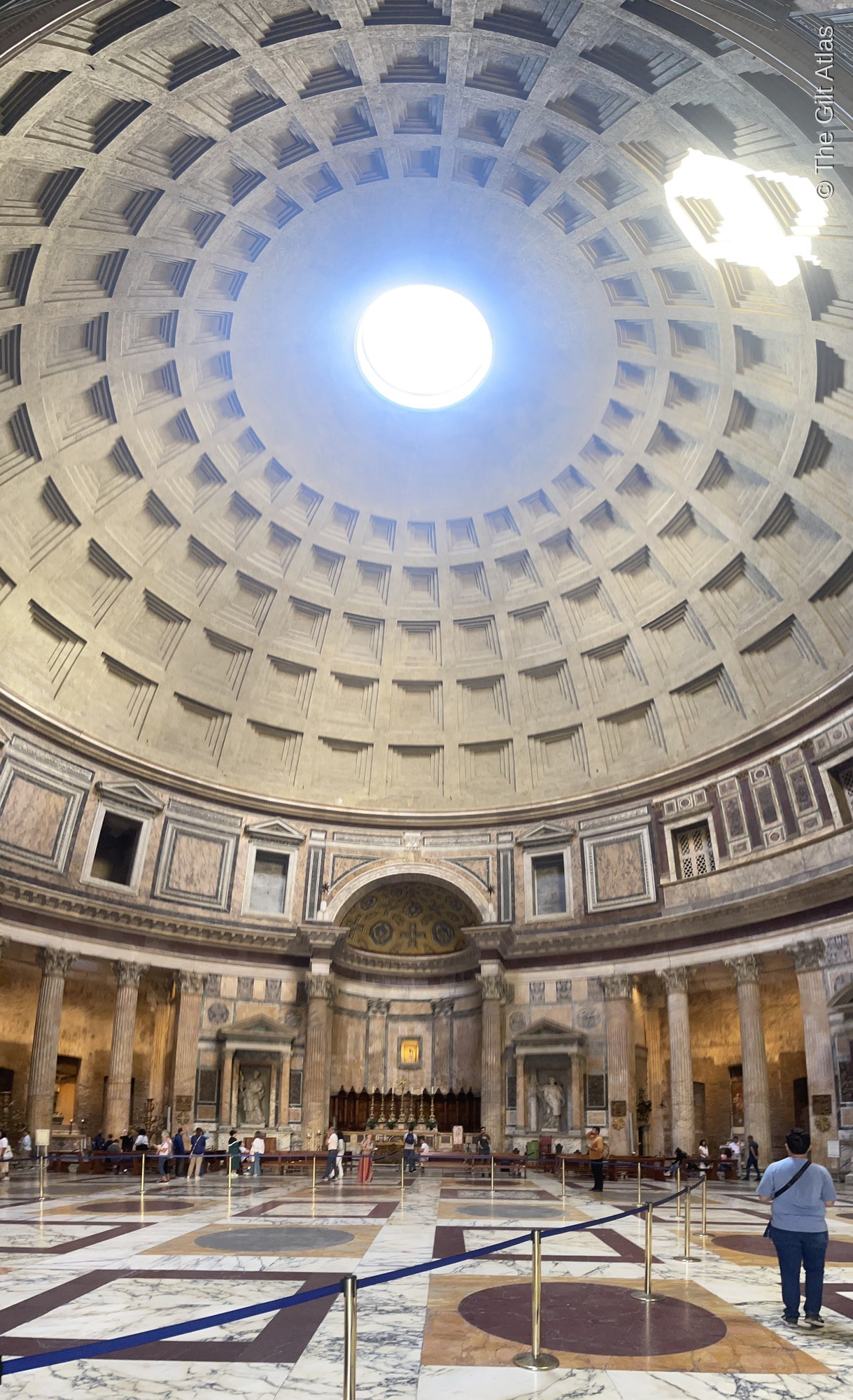 The Pantheon's concrete dome and oculus, with light streaming through the 9-metre opening to the sky
