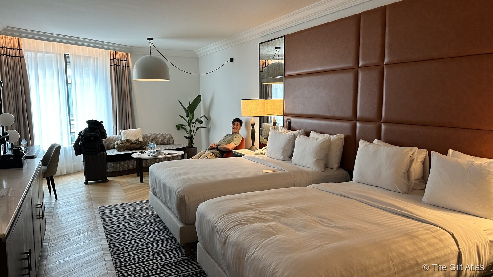 Paris Marriott Champs Élysées guest room with twin queen beds and sitting area
