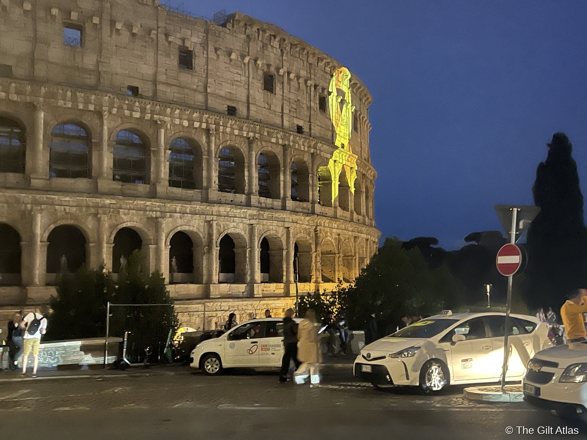 The Colosseum illuminated at night — Rome's ancient monuments glow after dark, when the crowds thin and the city reveals itself