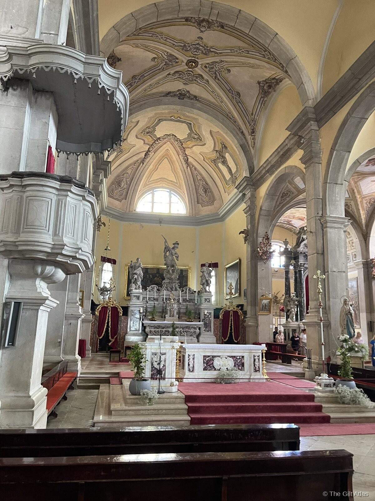 The Baroque interior of the Church of Saint Euphemia, Rovinj, with elegant columns and vaulted nave