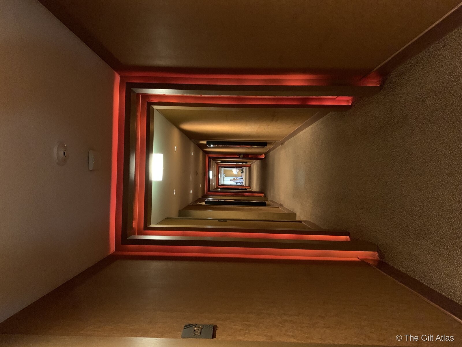 Dramatic red-framed corridor at Tambo del Inka