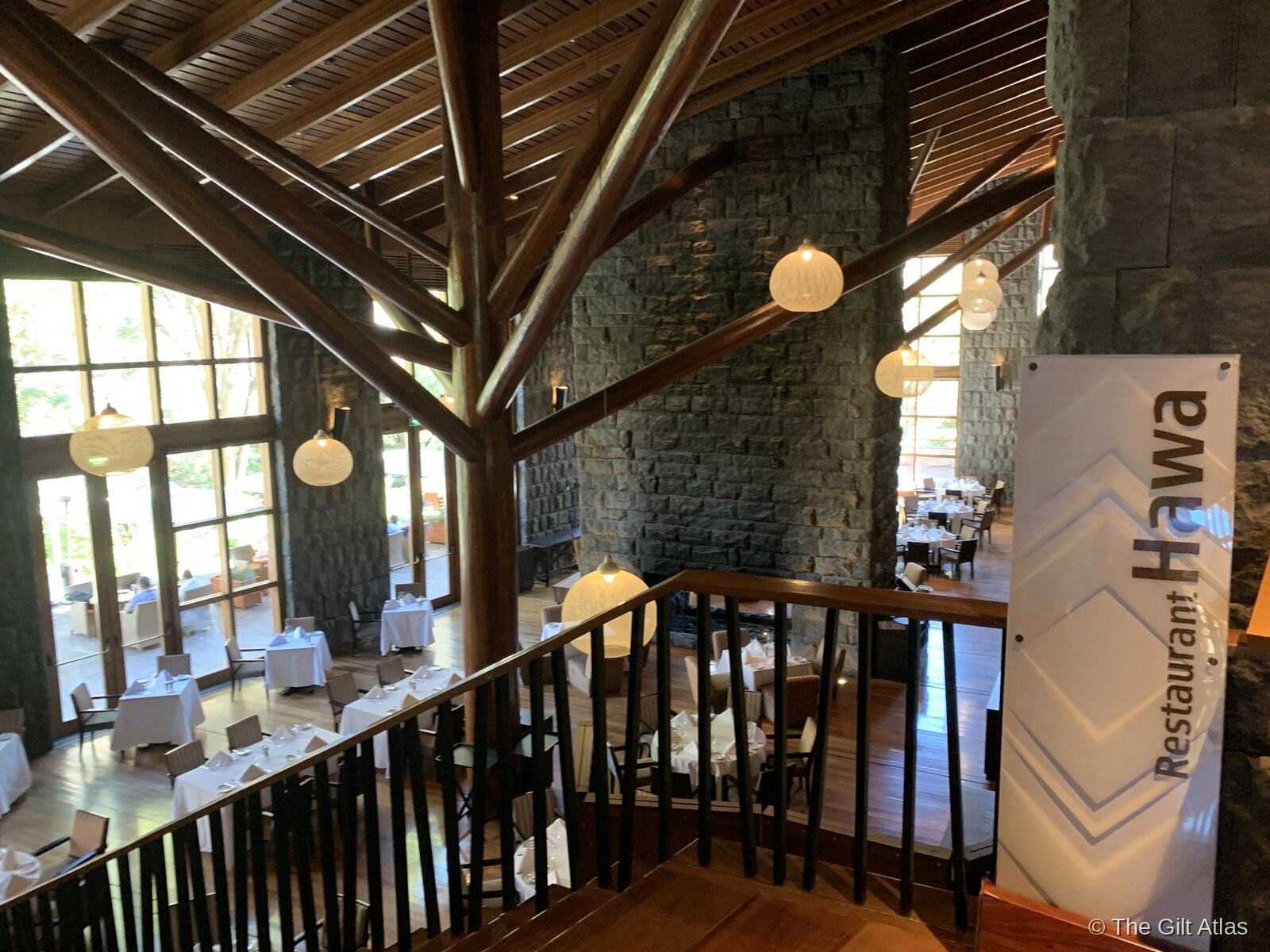 Hawa restaurant at Tambo del Inka — open dining room with warm timber and pendant lighting