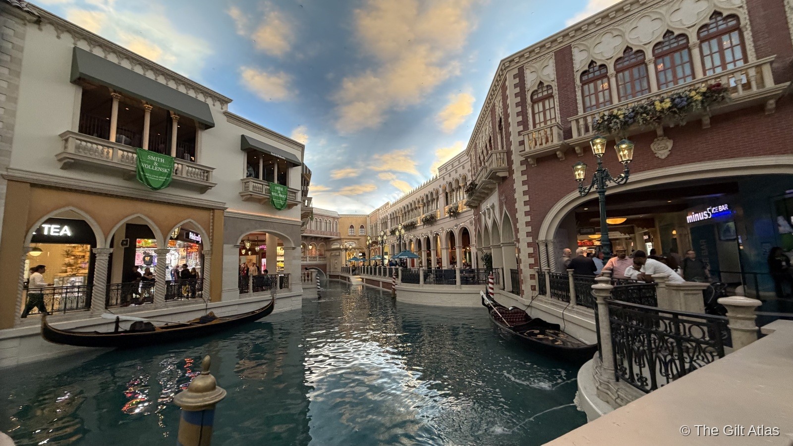 The Grand Canal Shoppes — gondolas on the indoor canal, Venetian-style facades, and the painted sky overhead