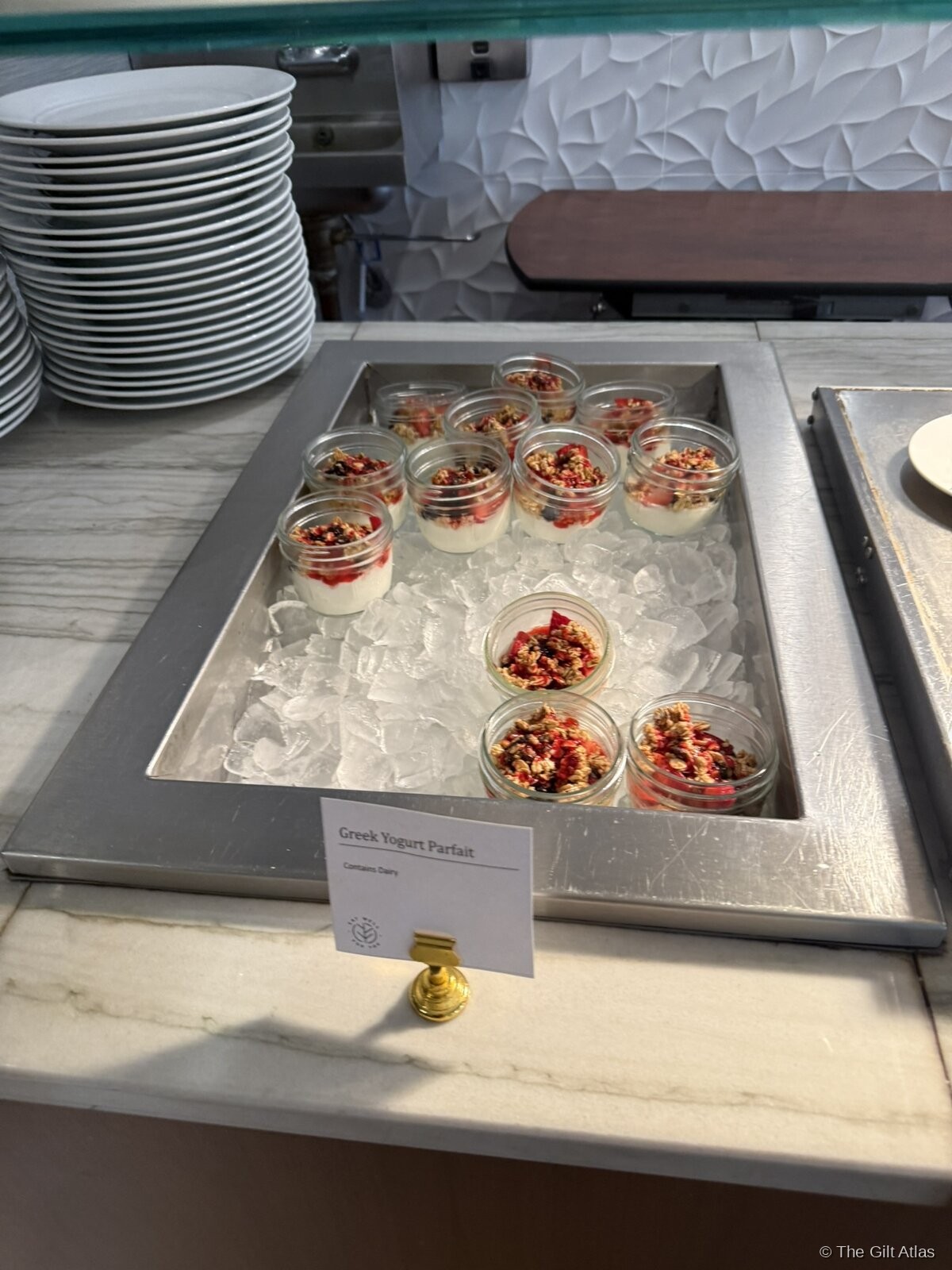 Greek yogurt parfaits in glass jars on ice at the Westin San Diego Bayview breakfast buffet — topped with berries and granola